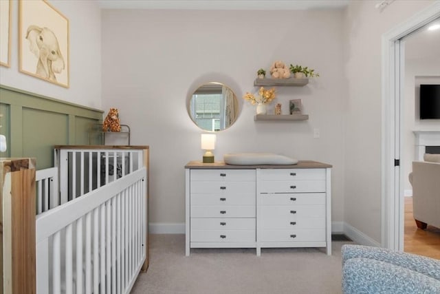 27 Sophia Dr, Rehoboth, MA 02769 - bedroom with light colored carpet, a nursery area, and baseboards