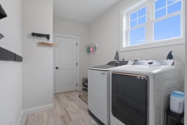 27 Sophia Dr, Rehoboth, MA 02769 - laundry area featuring separate washer and dryer and baseboards