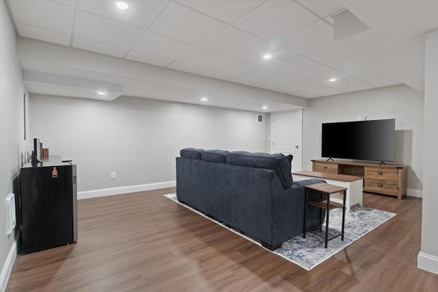 27 Sophia Dr, Rehoboth, MA 02769 - living room with baseboards, wood finished floors, and a paneled ceiling