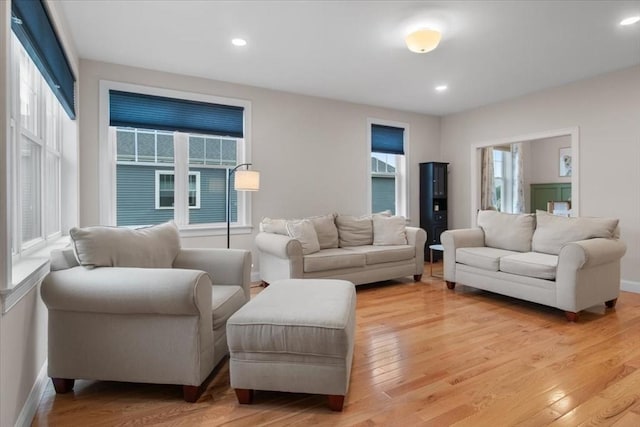 27 Sophia Dr, Rehoboth, MA 02769 - living area with light wood finished floors, baseboards, and recessed lighting