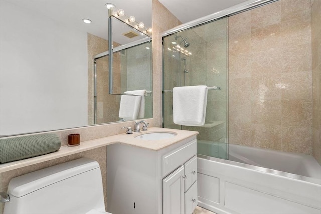 65 E India Unit 27F, Boston, MA 02110 - full bathroom with enclosed tub / shower combo, toilet, and vanity