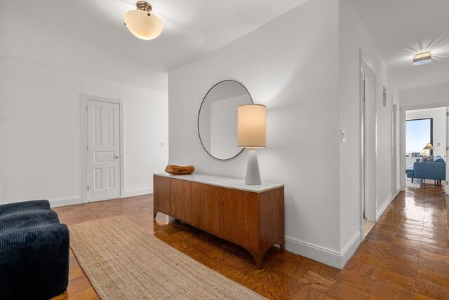 65 E India Unit 27F, Boston, MA 02110 - hallway with baseboards