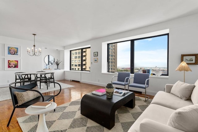 65 E India Unit 27F, Boston, MA 02110 - living room featuring a chandelier and baseboards