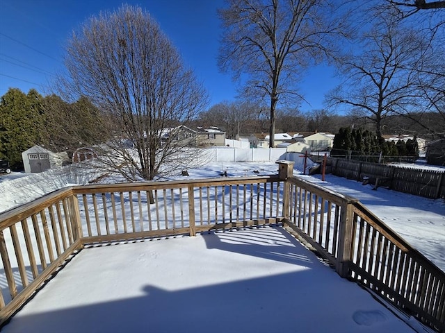 view of snow covered deck