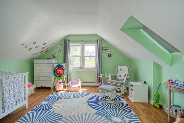 242 Furnace Brook Pkwy, Quincy, MA 02169 - bedroom with wood finished floors and vaulted ceiling
