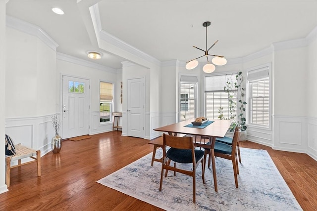 5 Redwood Path Unit 5, Hopkinton, MA 01748 - dining room featuring plenty of natural light, a chandelier, a decorative wall, ornamental molding, and a wainscoted wall