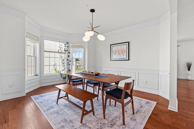 5 Redwood Path Unit 5, Hopkinton, MA 01748 - dining space featuring ornamental molding, dark wood-style flooring, wainscoting, a decorative wall, and a chandelier