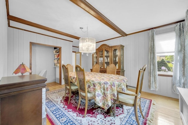 16 Highland Ave, Holden, MA 01520 - dining room with a chandelier, light wood-type flooring, ornamental molding, and beam ceiling