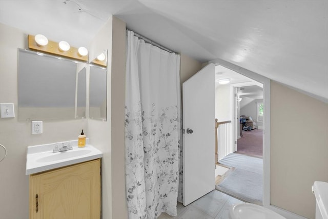 16 Highland Ave, Holden, MA 01520 - bathroom featuring lofted ceiling, vanity, curtained shower, and toilet