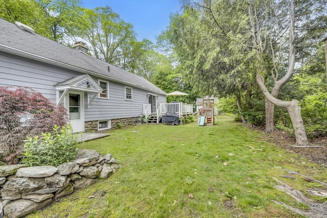 16 Highland Ave, Holden, MA 01520 - view of grassy yard with a deck