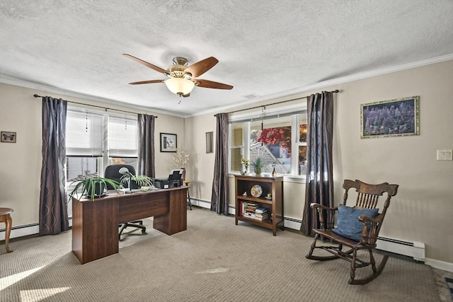 office area with ceiling fan, crown molding, a baseboard heating unit, light carpet, and baseboards