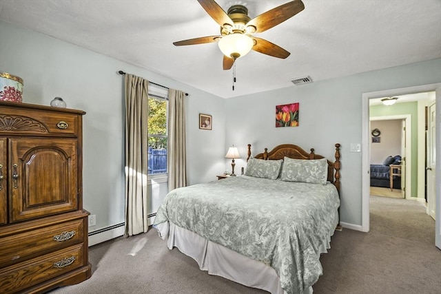 bedroom featuring dark carpet, baseboards, a baseboard radiator, and ceiling fan