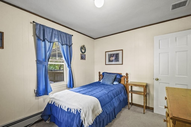 bedroom with a baseboard heating unit, carpet floors, and ornamental molding