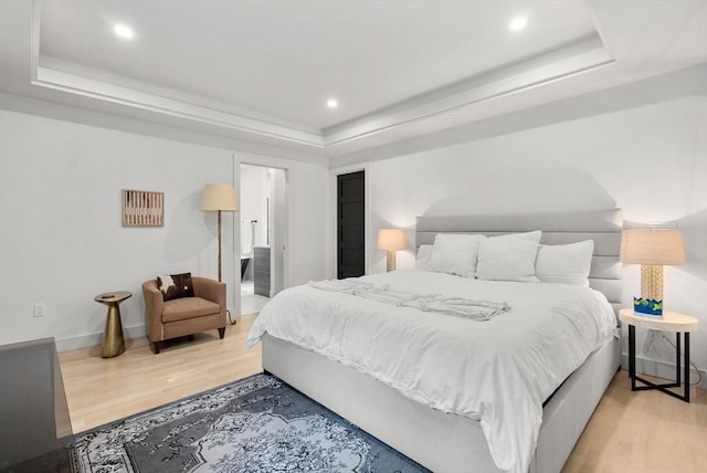 1242 Beacon St, Newton, MA 02468 - bedroom featuring a tray ceiling, wood finished floors, baseboards, and recessed lighting