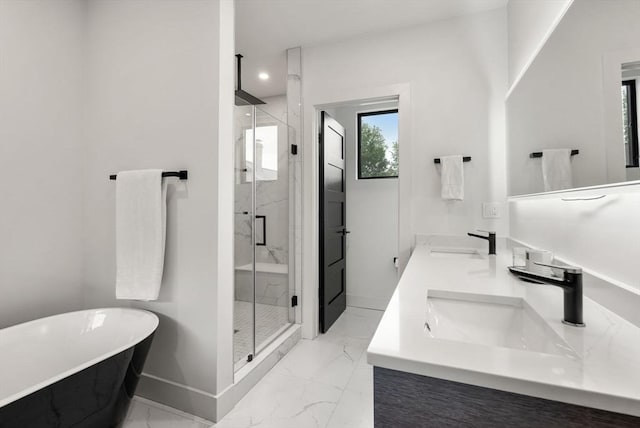 1242 Beacon St, Newton, MA 02468 - bathroom featuring marble finish floors, a marble finish shower, a soaking tub, double vanity, and baseboards