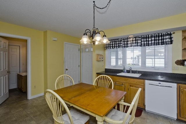 585 Sheridan St Unit 36, Chicopee, MA 01020 - dining room featuring an inviting chandelier, baseboards, and a textured ceiling