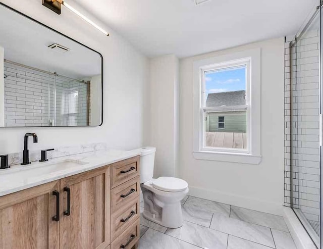 52-54 Bonair St, Somerville, MA 02145 - bathroom featuring vanity, a shower, and tile patterned flooring