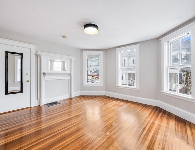52-54 Bonair St, Somerville, MA 02145 - unfurnished living room featuring light wood-style floors
