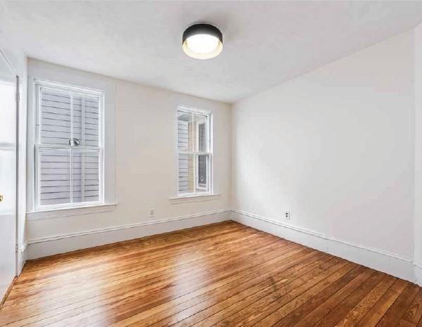 52-54 Bonair St, Somerville, MA 02145 - spare room featuring light wood-style floors