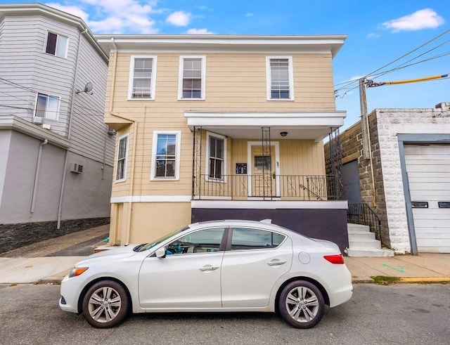 52-54 Bonair St, Somerville, MA 02145 - view of front of property with a porch