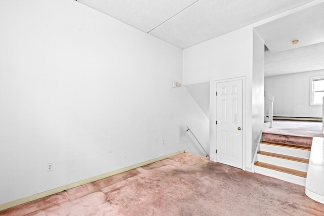 interior space featuring carpet and a baseboard radiator