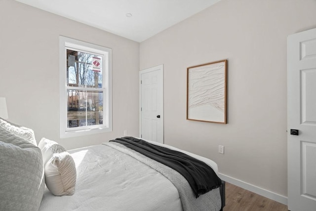 28 Hansborough St Unit 4, Boston, MA 02124 - bedroom featuring wood finished floors and baseboards