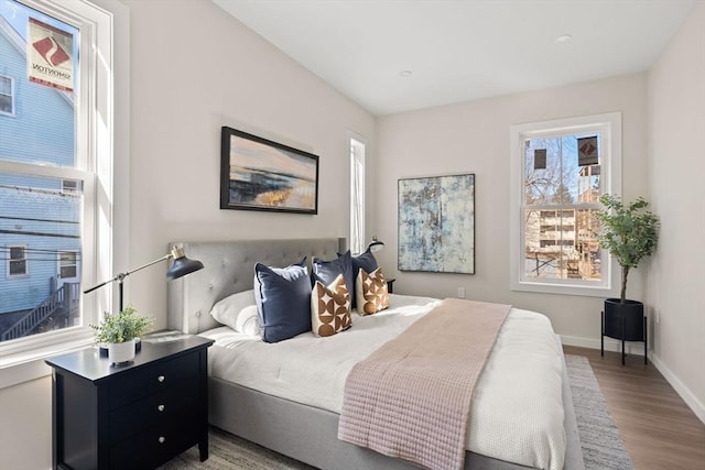 28 Hansborough St Unit 4, Boston, MA 02124 - bedroom with wood finished floors and baseboards