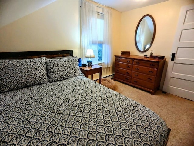 40 Ayer Rd, Shirley, MA 01464 - bedroom with carpet floors and a baseboard heating unit