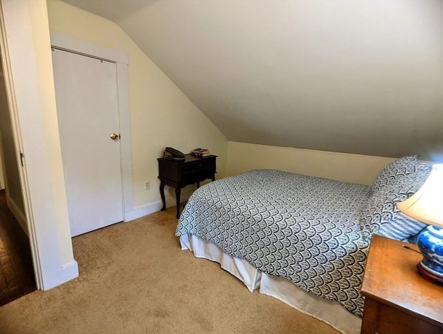 40 Ayer Rd, Shirley, MA 01464 - bedroom with lofted ceiling and light carpet