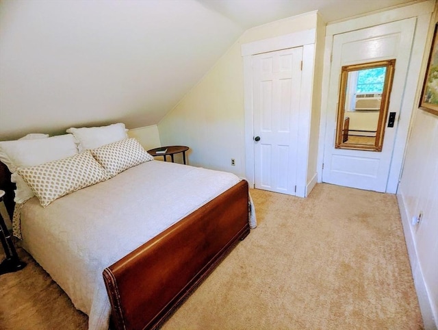 40 Ayer Rd, Shirley, MA 01464 - bedroom with vaulted ceiling, carpet flooring, and a baseboard radiator