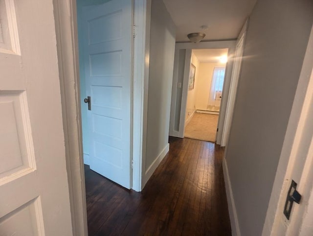 40 Ayer Rd, Shirley, MA 01464 - hallway with dark wood finished floors and baseboards