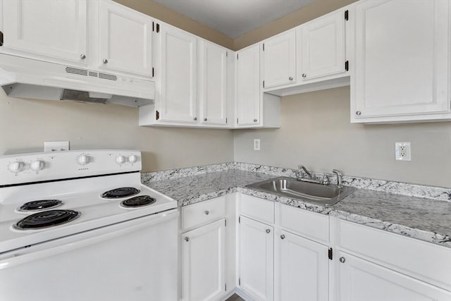 32 Worcester Rd, Charlton, MA 01507 - kitchen with electric stove, a sink, under cabinet range hood, and white cabinets