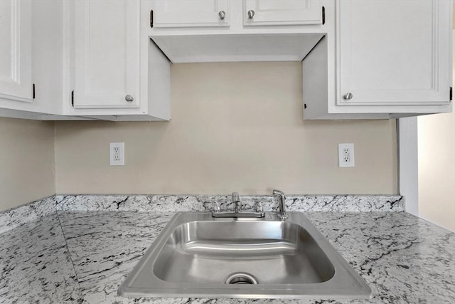 32 Worcester Rd, Charlton, MA 01507 - kitchen with a sink, light countertops, and white cabinetry