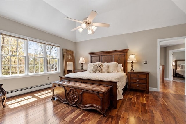 bedroom with baseboards, ceiling fan, baseboard heating, and dark wood-type flooring