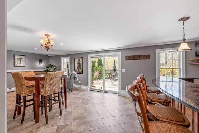 dining area featuring a notable chandelier, recessed lighting, baseboards, light tile patterned floors, and a baseboard heating unit