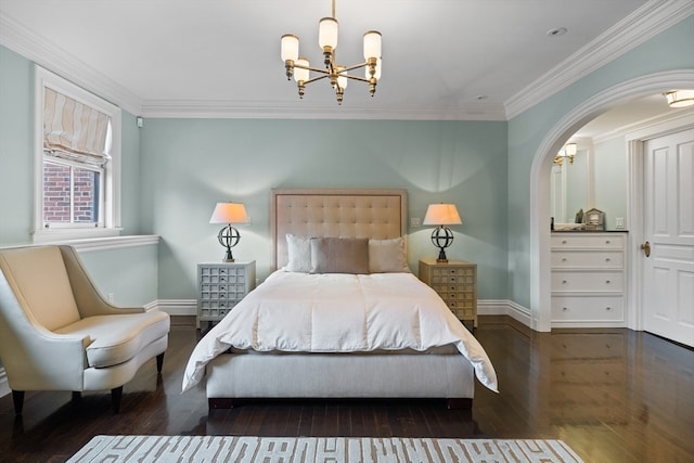 bedroom featuring ornamental molding, dark hardwood / wood-style floors, and an inviting chandelier