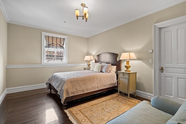 bedroom with dark wood-type flooring, a chandelier, and crown molding