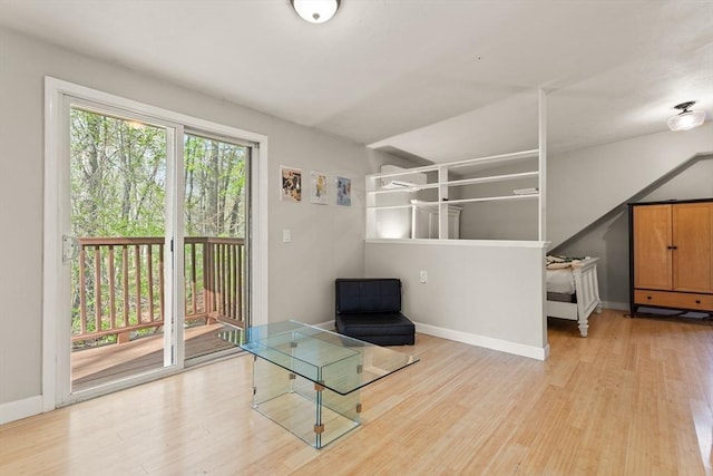 unfurnished room featuring light wood-style floors and baseboards