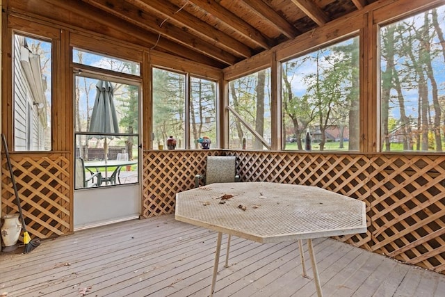 sunroom / solarium with outdoor dining area
