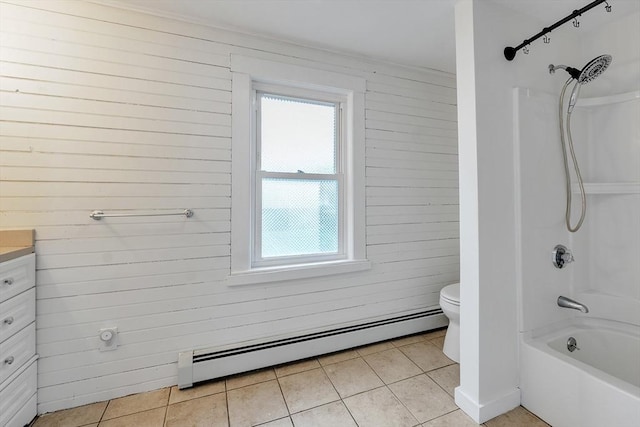 bathroom with a baseboard radiator, tile patterned flooring, vanity, toilet, and  shower combination