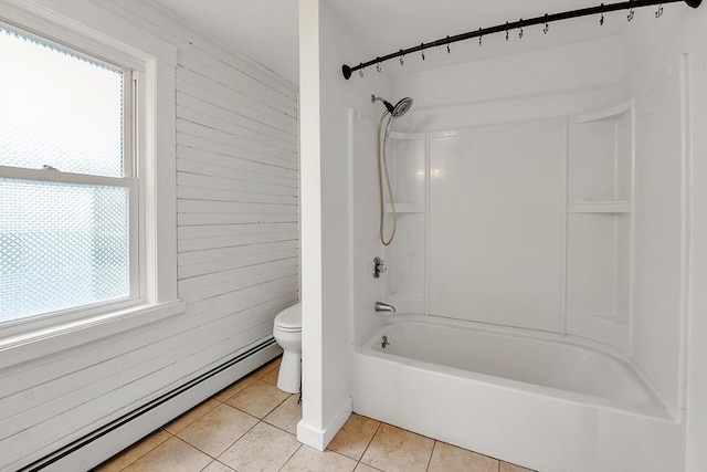 full bathroom with a baseboard radiator, tile patterned flooring, toilet, healthy amount of natural light, and wood walls