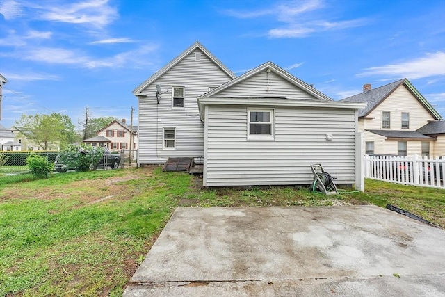 rear view of house with a patio area