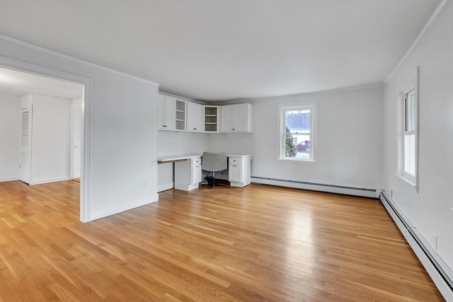 unfurnished living room with a baseboard radiator, crown molding, light wood finished floors, and baseboards