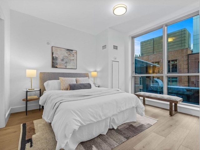 bedroom featuring light hardwood / wood-style floors