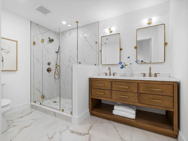 bathroom featuring vanity, toilet, and walk in shower