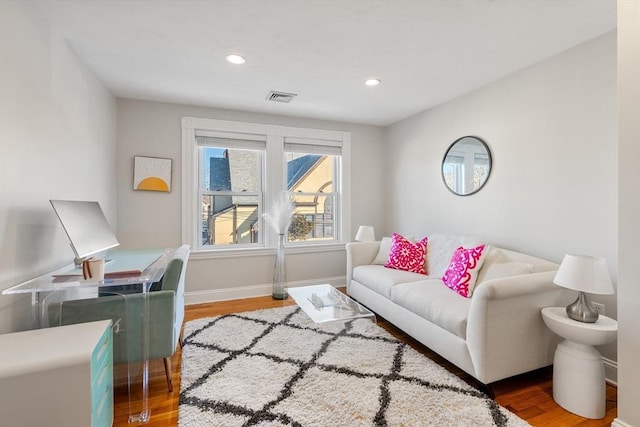 living room with hardwood / wood-style flooring