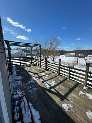 view of snow covered deck