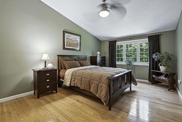 8 Birchwood Ln Unit 8, Hopkinton, MA 01748 - bedroom with vaulted ceiling, light wood finished floors, and ceiling fan