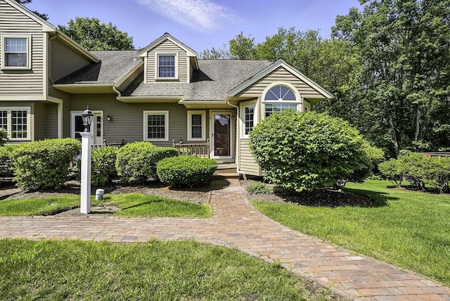8 Birchwood Ln Unit 8, Hopkinton, MA 01748 - view of front of house featuring a front yard and roof with shingles