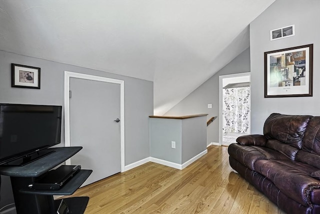 8 Birchwood Ln Unit 8, Hopkinton, MA 01748 - living room with vaulted ceiling and wood finished floors